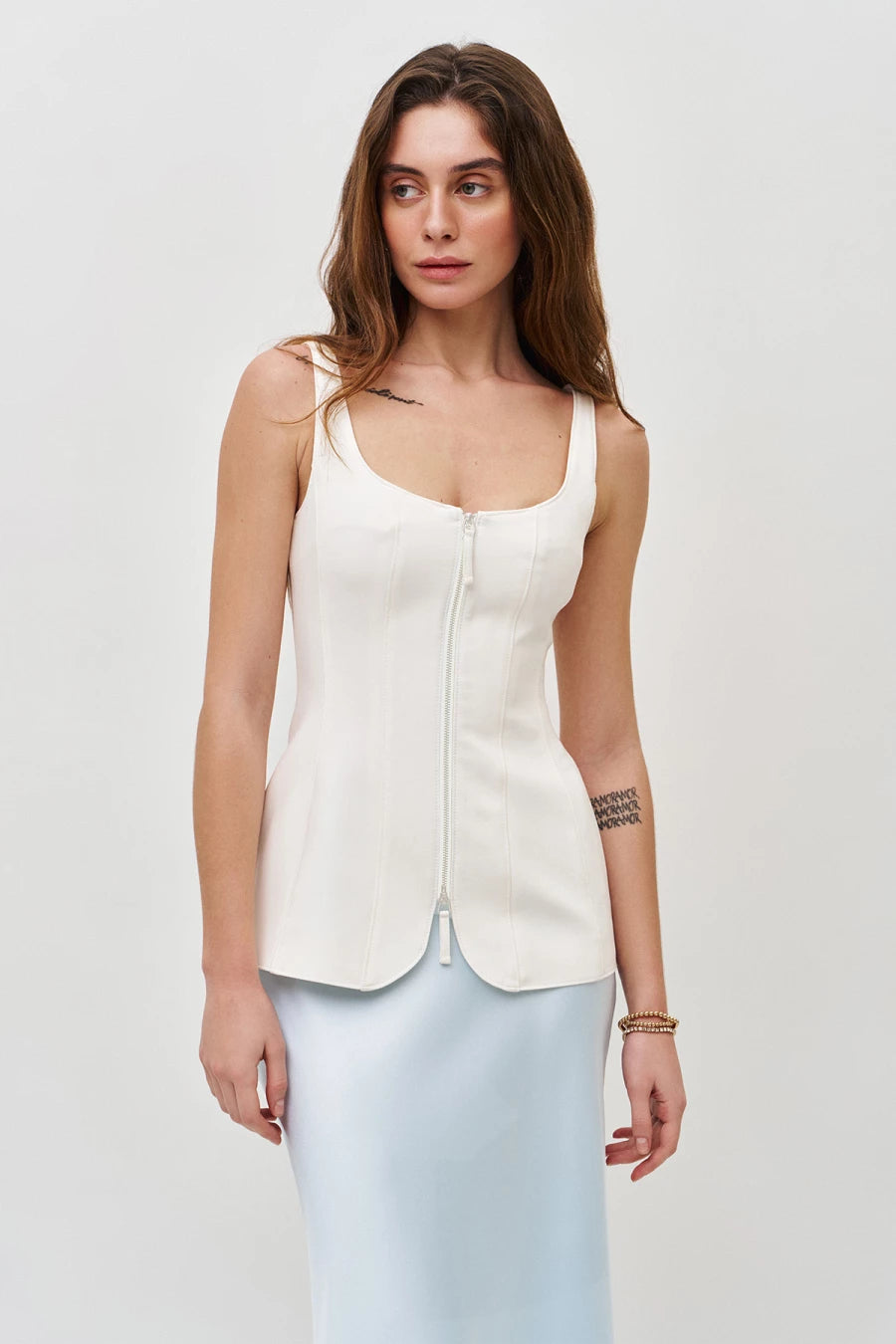 Cream corset top with a zip