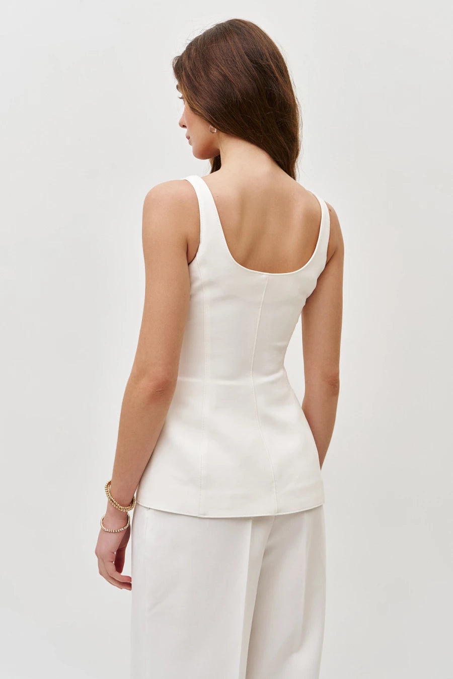 Cream corset top with a zip