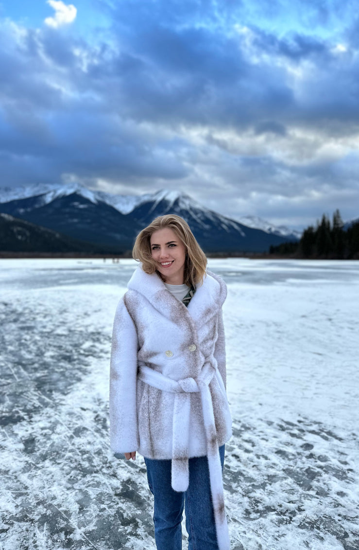 Stylish vegan fur coat with hood