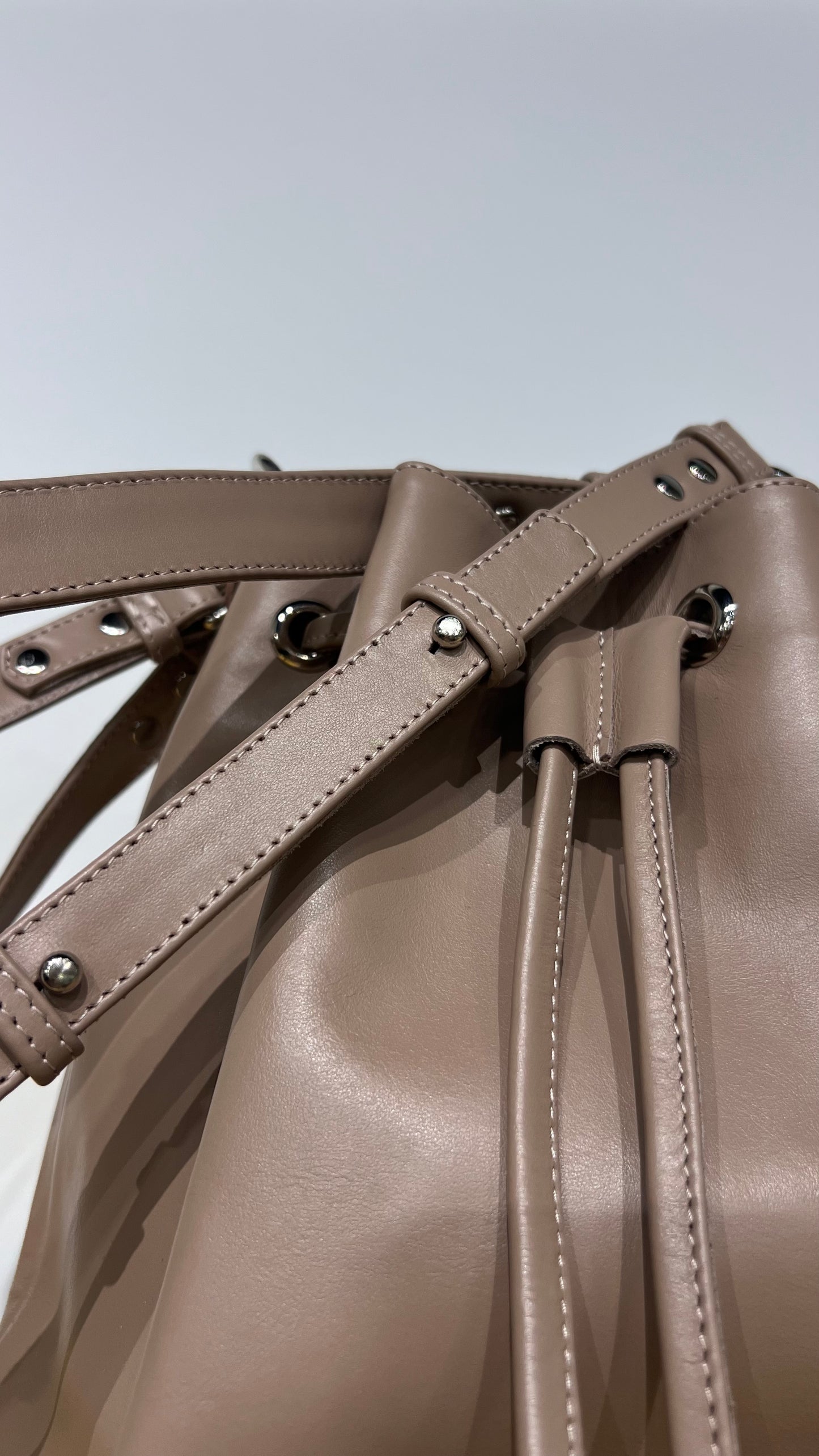 Beige leather pouch bag