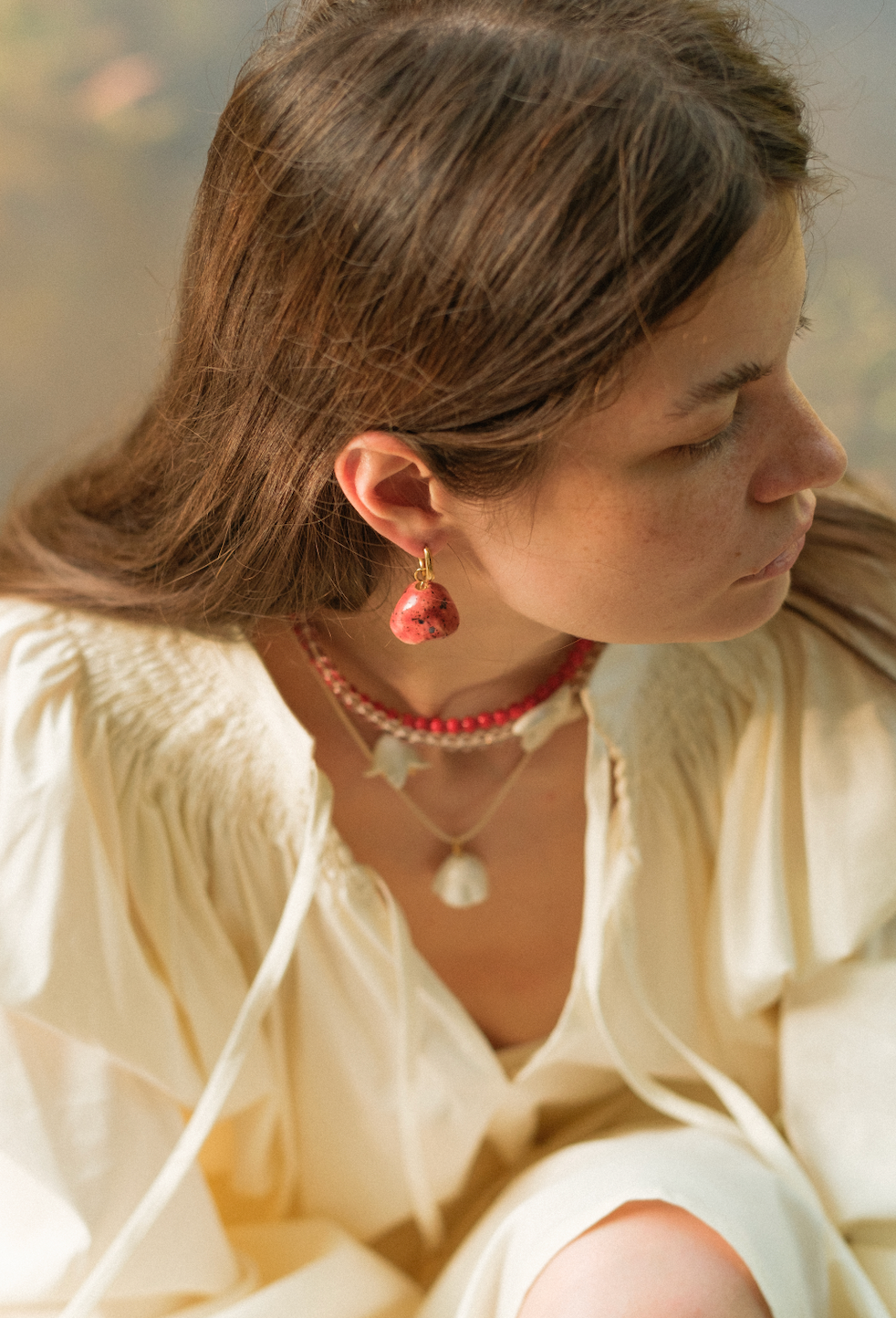 [P O L Y S K]  earring with a porcelain poppy flower