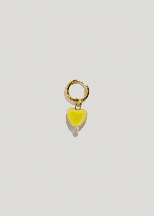 [U A]  earring with a yellow porcelain heart