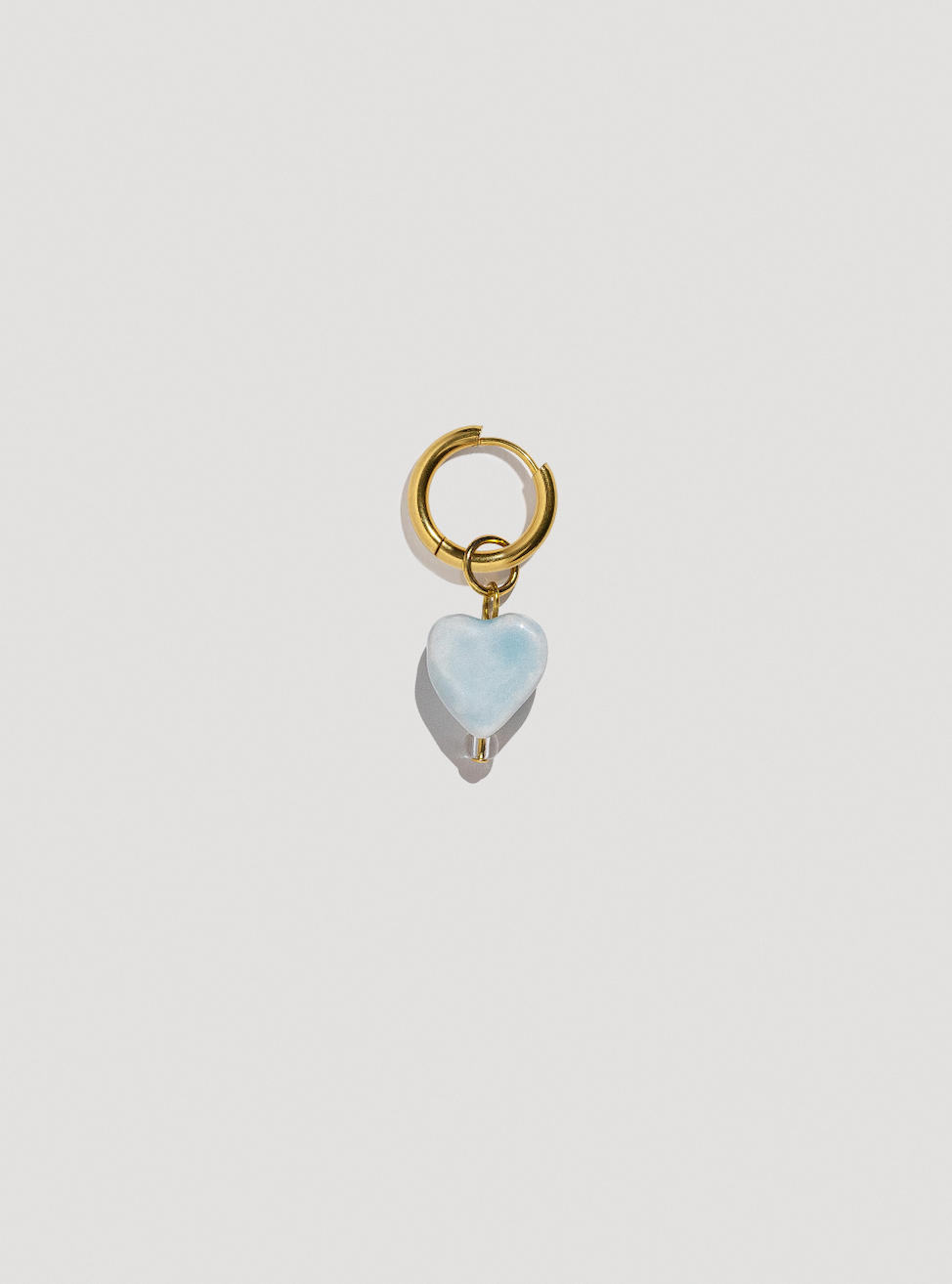 [U A]  earring with a blue porcelain heart