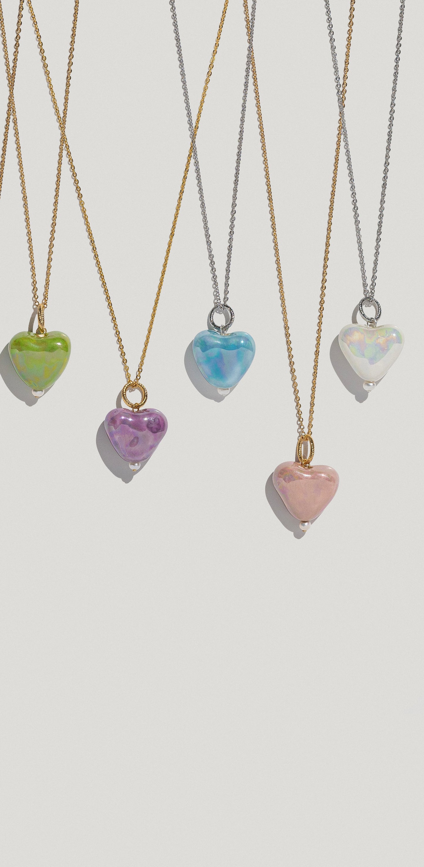 Porcelain heart on gold cover chain