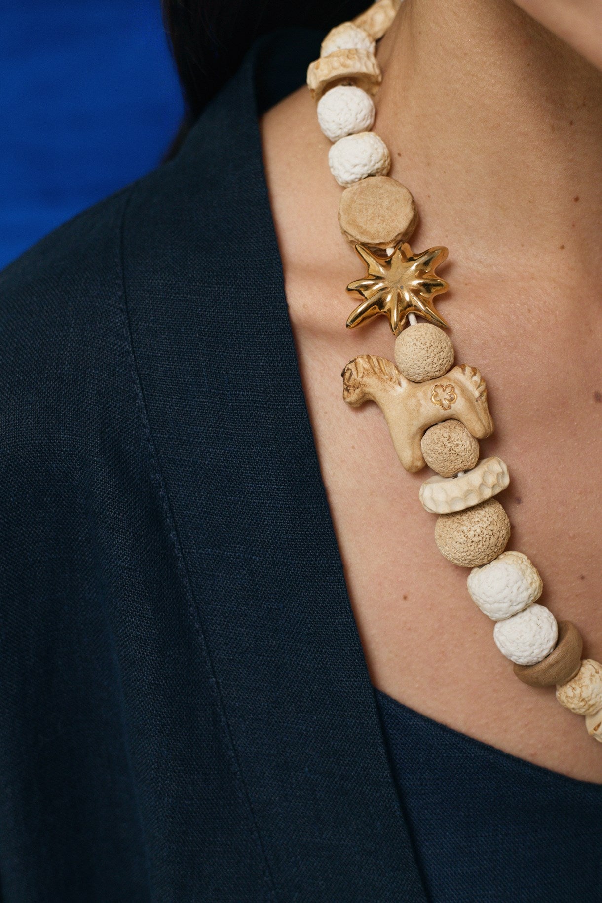 DREAM necklace made of ground beads with a gold star