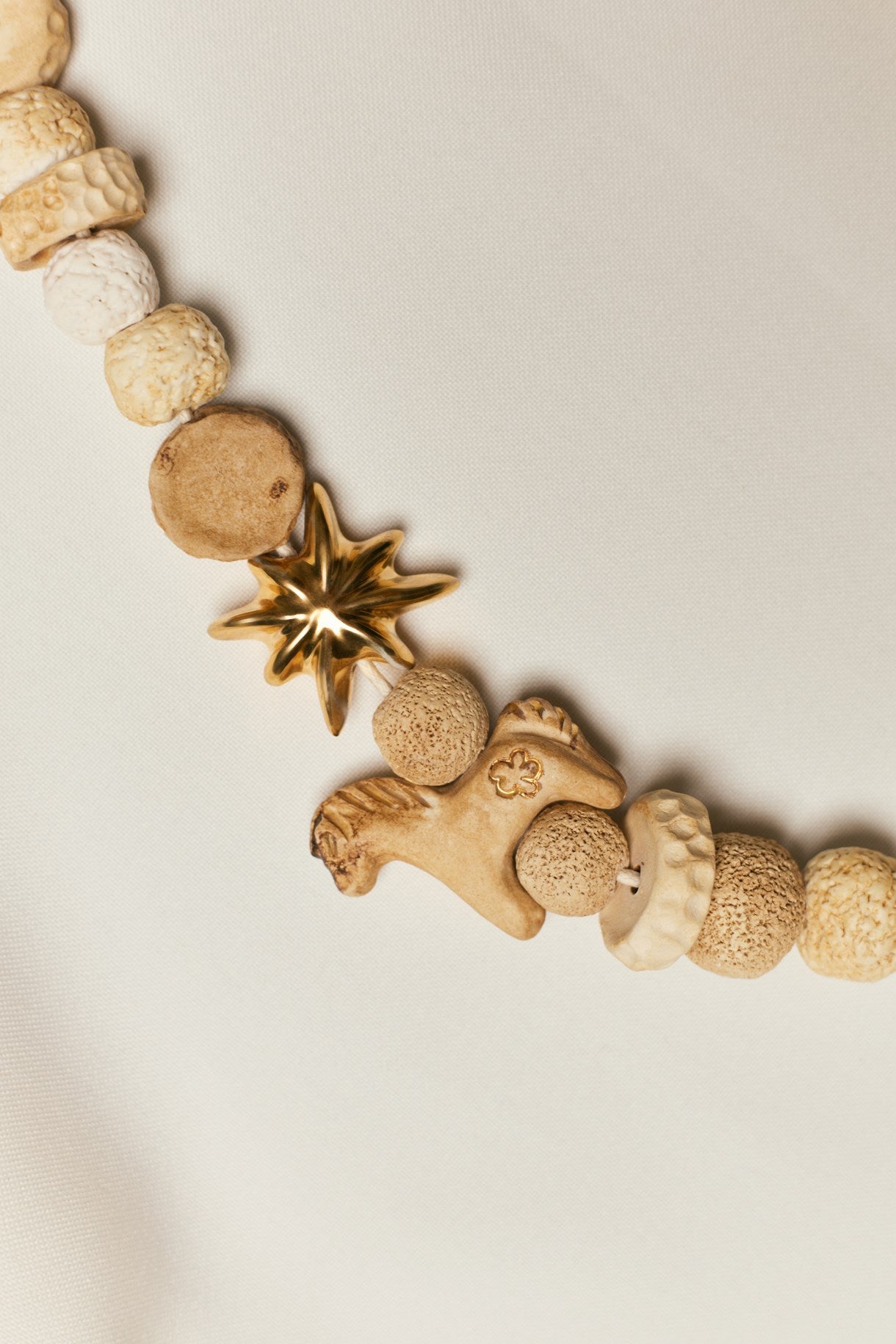 DREAM necklace made of ground beads with a gold star