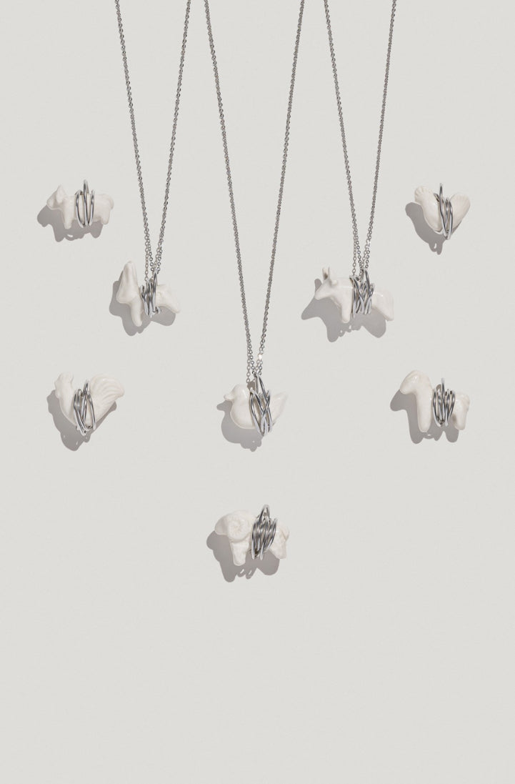 LIULI pendant in a metal frame on a chain rabbit