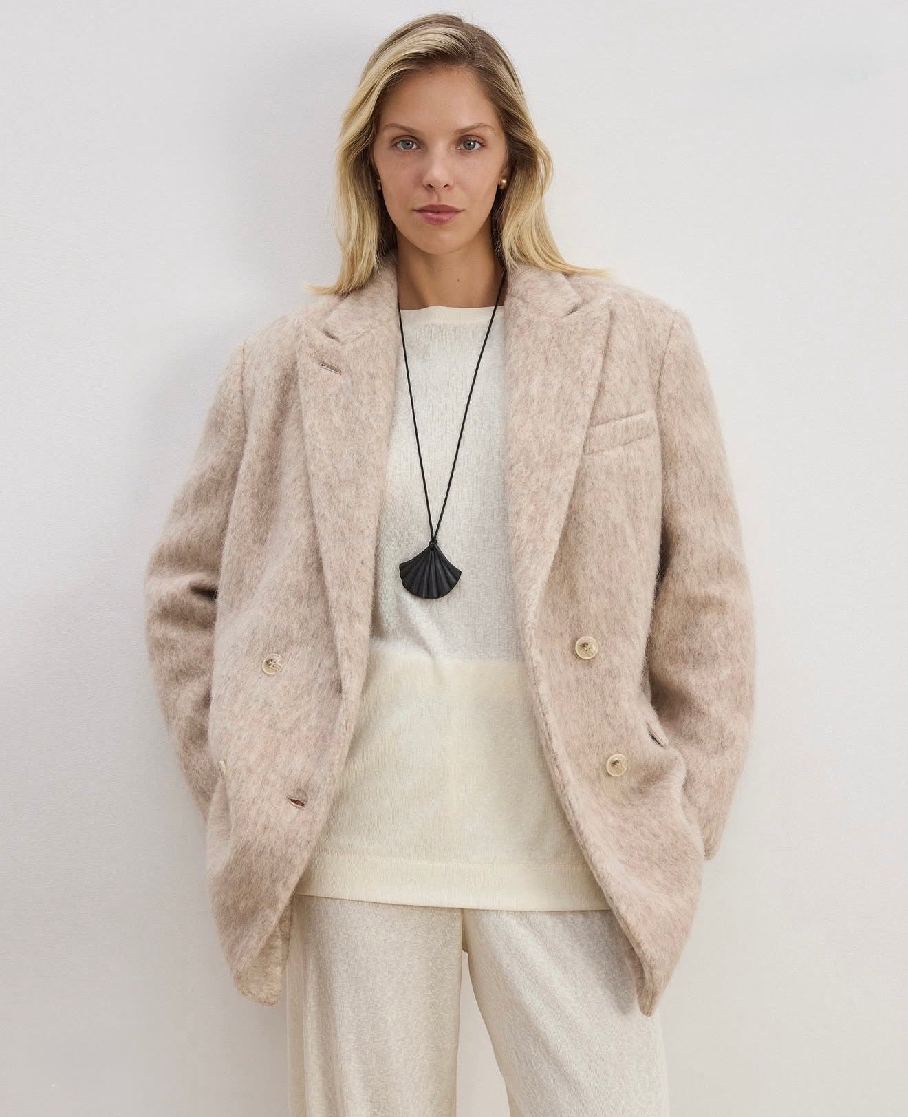 Double-breasted coat-jacket made of pile fabric