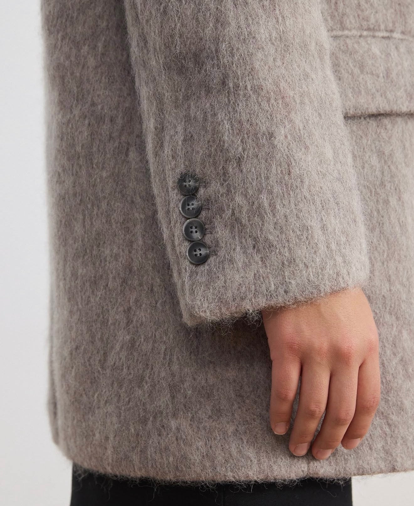 Double-breasted coat-jacket made of pile fabric