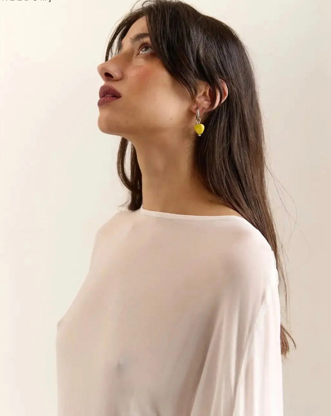 [U A]  earring with a yellow porcelain heart