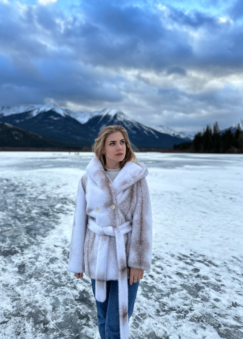 Stylish vegan fur coat with hood