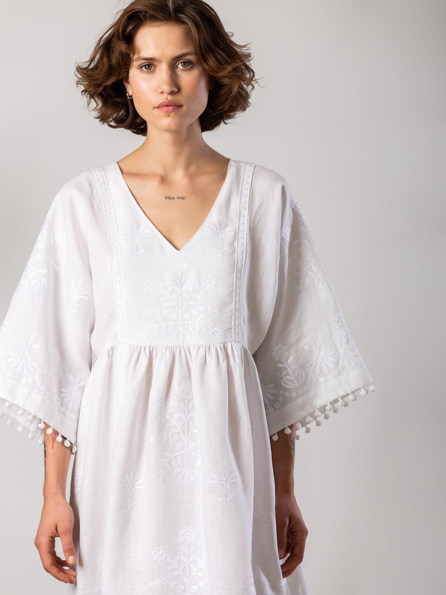 White easy linen dress with floral embroidery Virgin