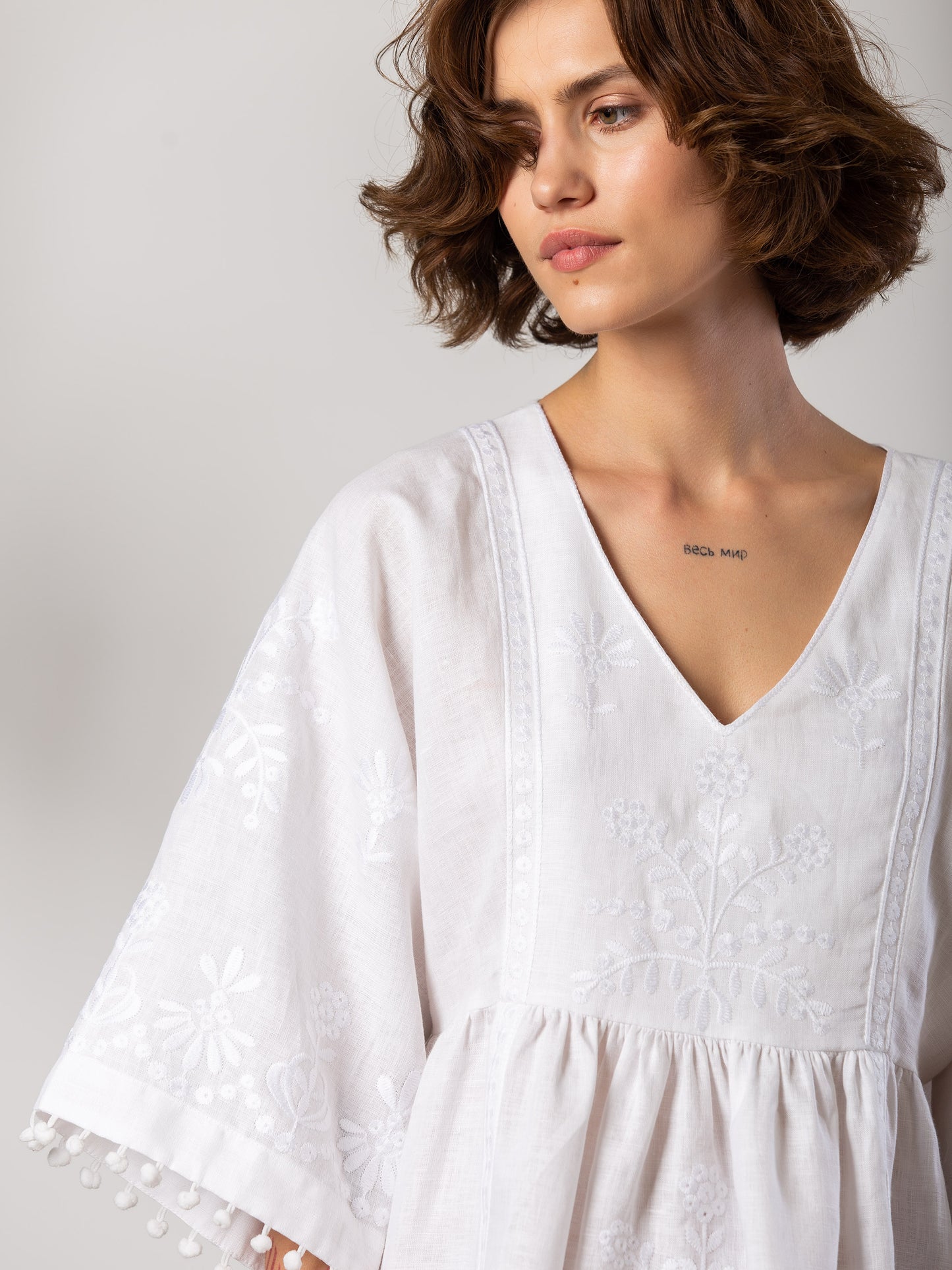 White easy linen dress with floral embroidery Virgin